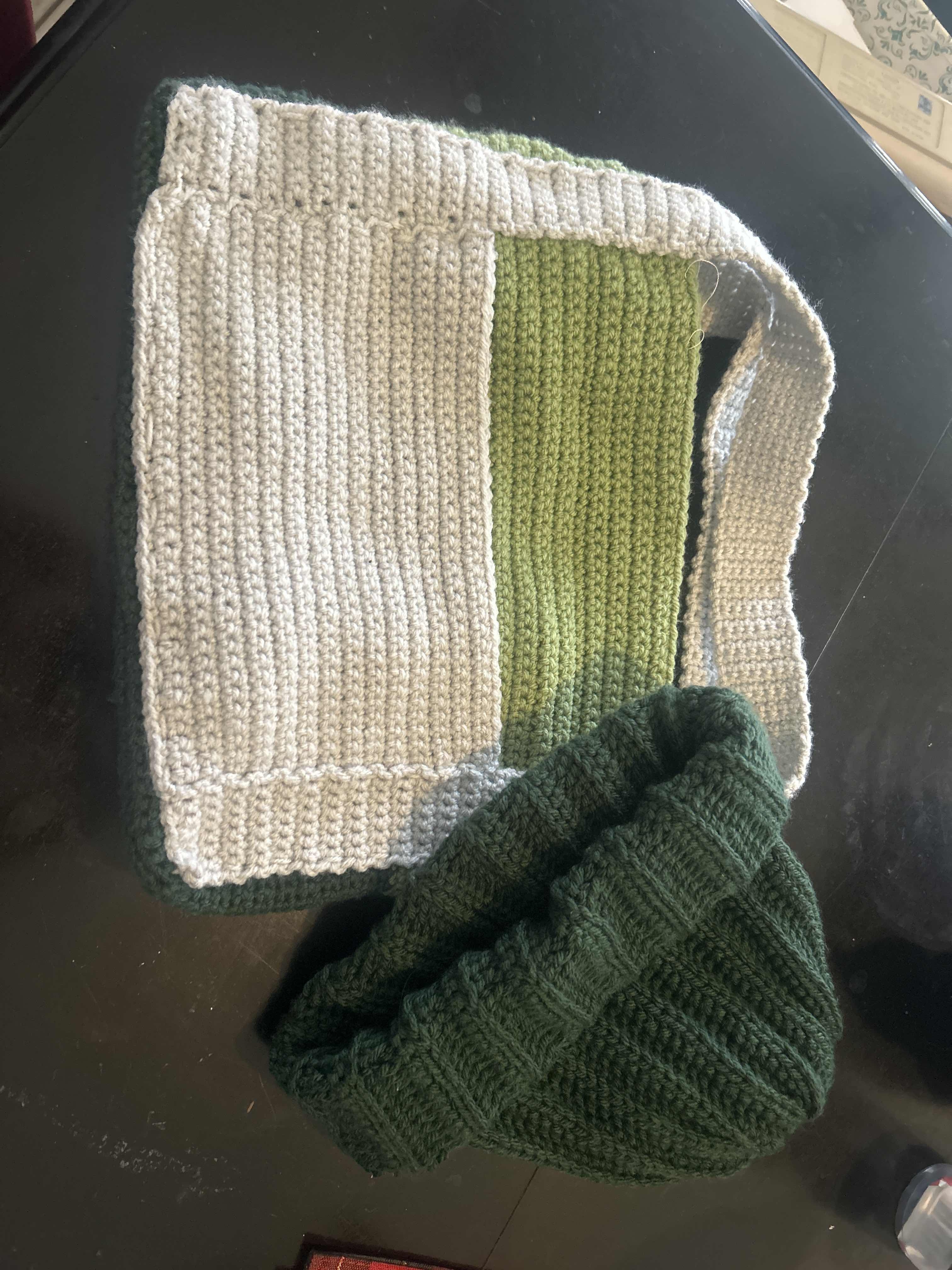 Green and grey crochet bag with dark green crochet beanie