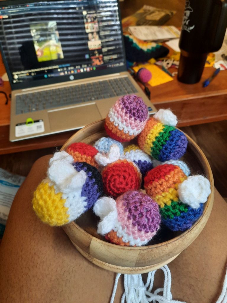 A bowl of colorful pride bees